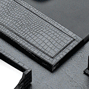 close up detail of leather croco desk blotter